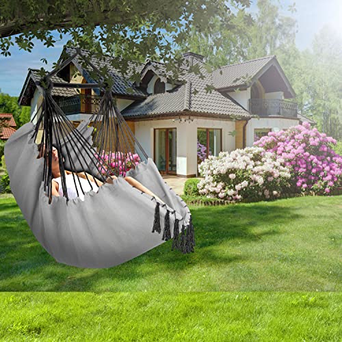 Vista en bonito jardín con la Silla Colgante con 2 Cojines, portabebidas y Compartimento para Libros. Adultos y niños, resiste hasta 150 kg, para Interior y Exterior, Grigio. KESSER®