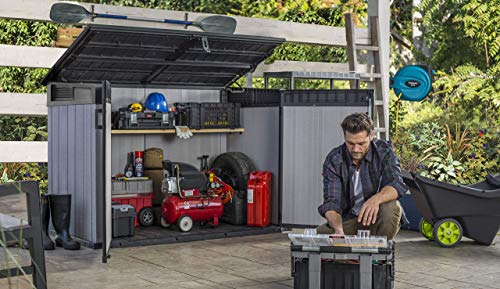 Cobertizo de jardín exterior Duotech Grande Store, 2.020 litros, Color gris. Vista general. Arcón en patio para guardar pequeña maquinaria para jardinería y mantenimiento. Keter