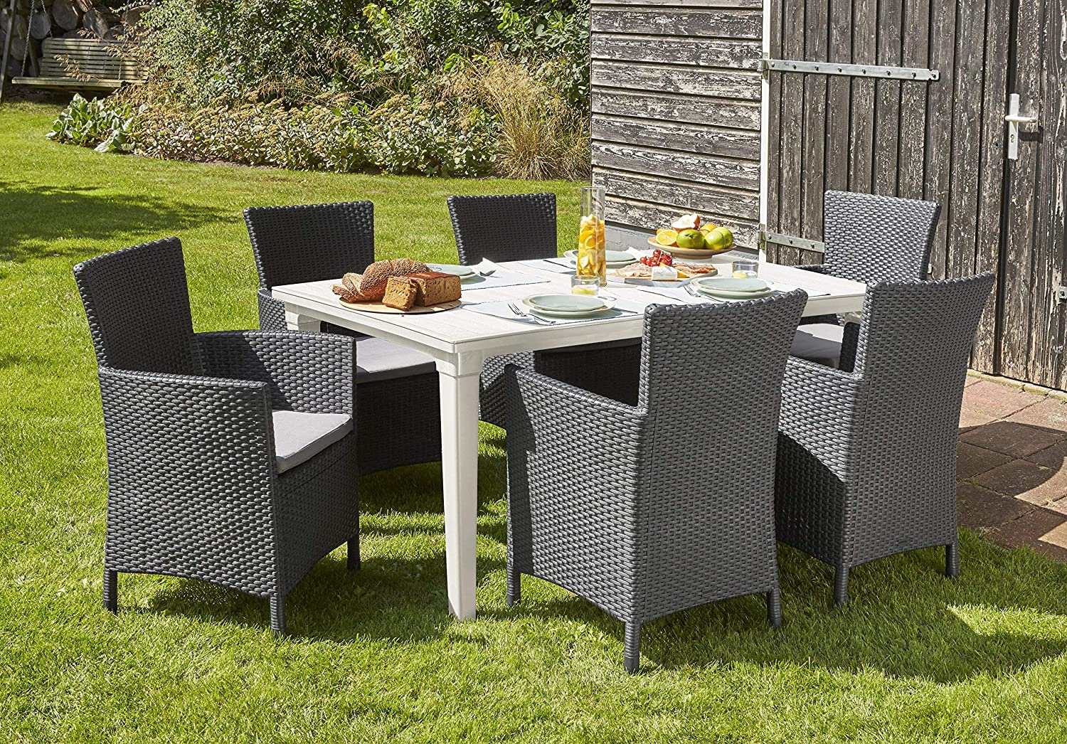 Sillones Keter Iowa en Rattán de exterior e interior con cojín incluido color grafito al aire libre en jardín. Keter