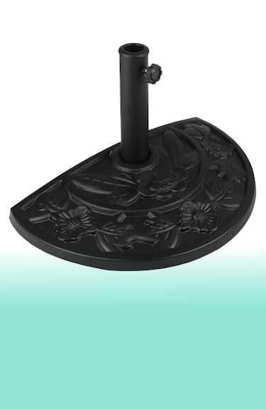 Pie de sombrilla para pared negro con motivos florales de cemento sobre fondo blanco y verde