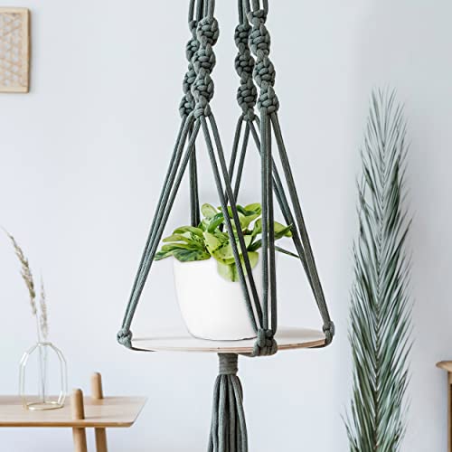 Maceta de plástico blanca con planta en ambiente interior Utopia Home