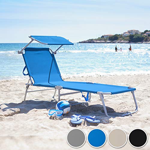 En la playa con la tumbona del Set de 2 Cama Hamaca Tumbonas de Aluminio Plegable con Parasol para Exterior. TecTake